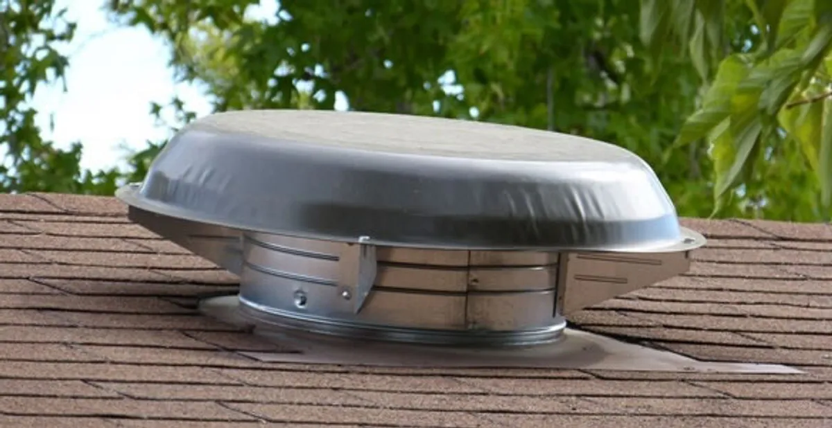 attic fan installation services with low-profile roof ventilation unit in Allentown, PA