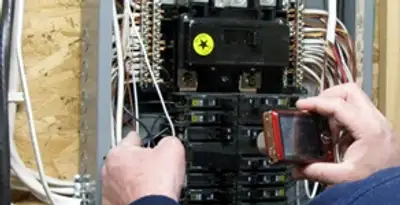 Home electrical inspection of circuit breaker panel by licensed electrician in Allentown, PA