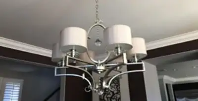 Modern chandelier installation with multiple light fixtures in Allentown, PA