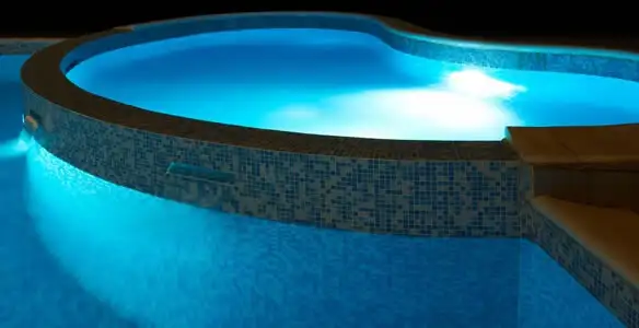pool light installation and repair services highlighting illuminated pool interior lighting in Allentown, PA